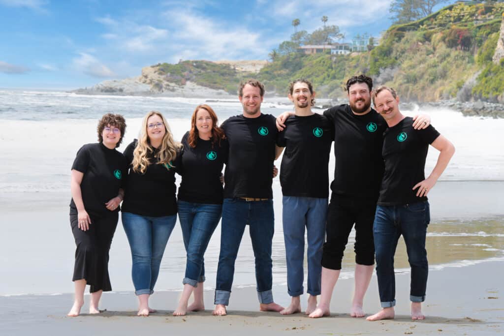 Team photo shoot for Dyno Creative at the beach, captured by Art of Portraits, Newport Beach, CA