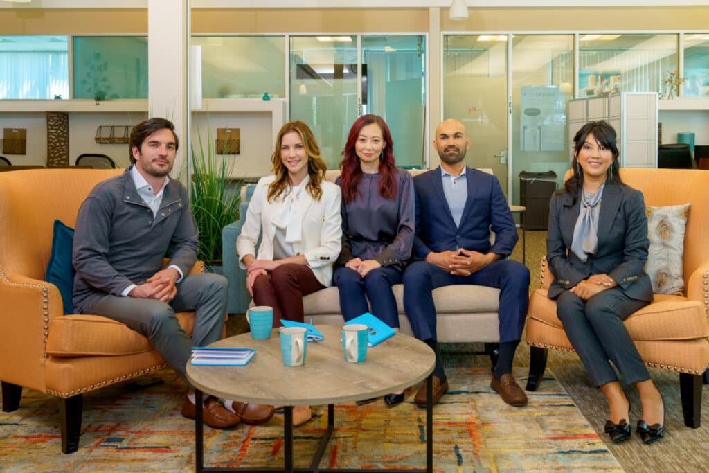 Corporate lifestyle group photo captured by Art of Portraits, featuring team collaboration and outdoor branding session