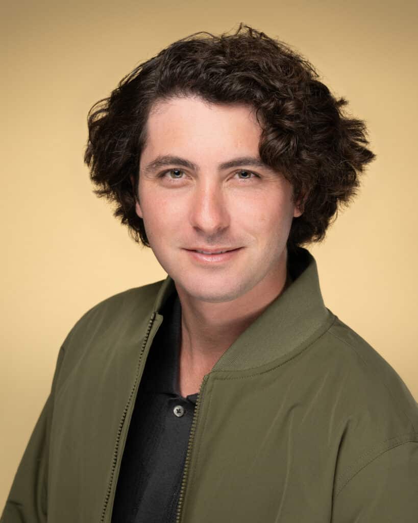 Headshots of Tyler Hill showcasing a friendly look, with a warm smile and approachable demeanor.