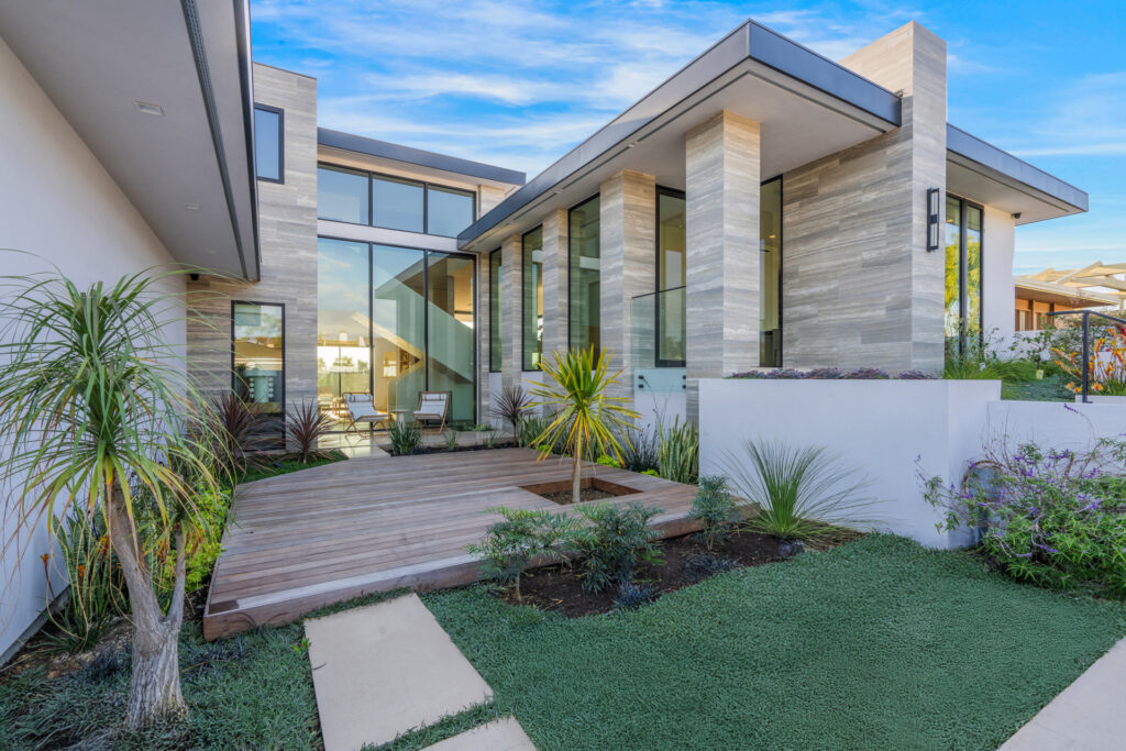 Front exterior of a luxurious Newport Beach home—captured by Art of Portraits® for premium real estate photography in Orange County, CA.